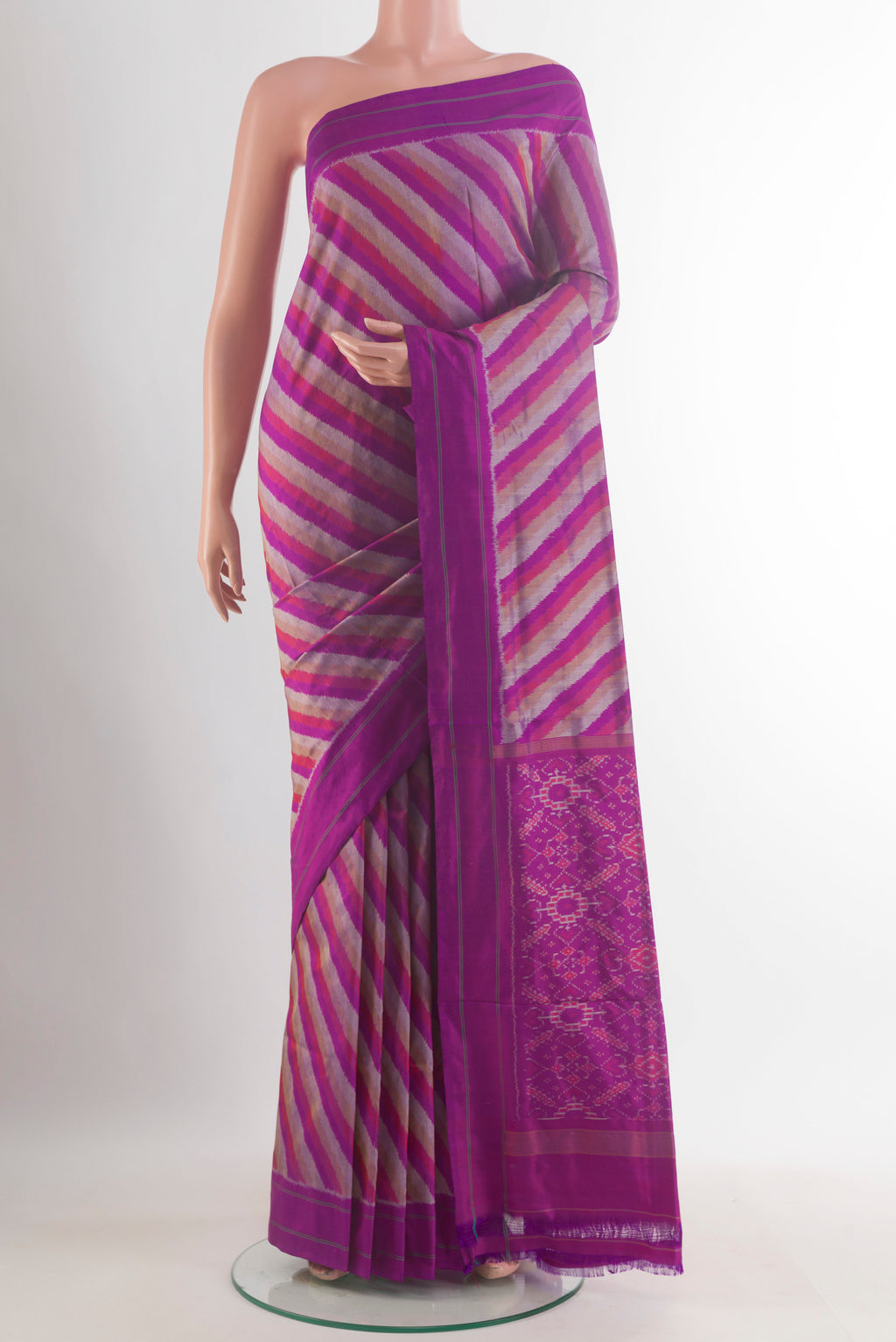 Pure Silk Purple Pochampally Saree with Pure Ikat on the body and Plain Border.  displayed on a mannequin
