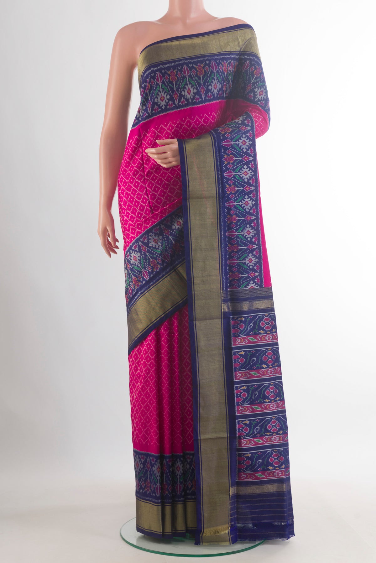 Pure Silk Pink Pochampally Saree with Pure Ikat on the body and Zari Border.  displayed on a mannequin