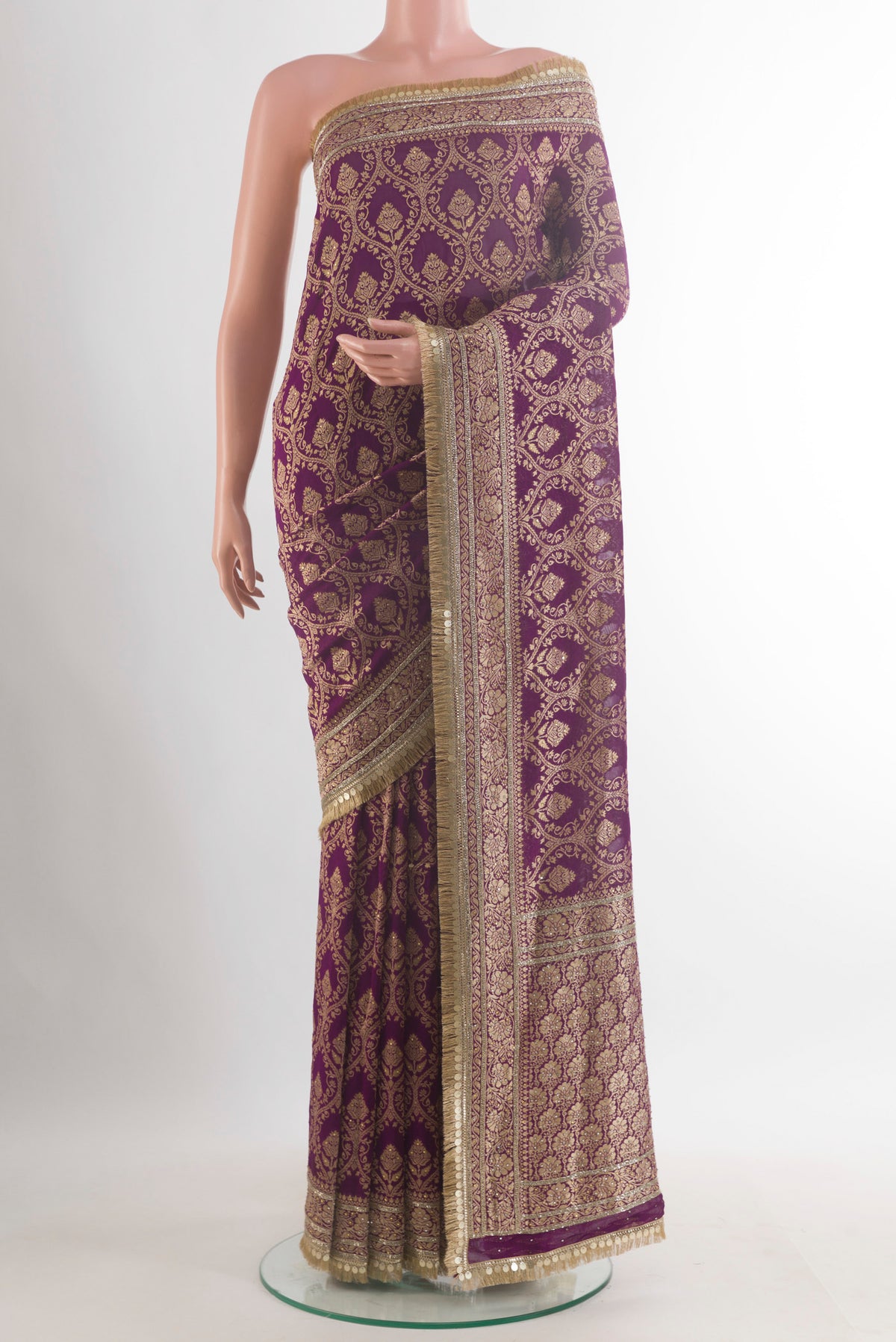 Purple Blended Banarasi Georgette Saree with Zari Brocade on the body and Zari Border.  displayed on a mannequin