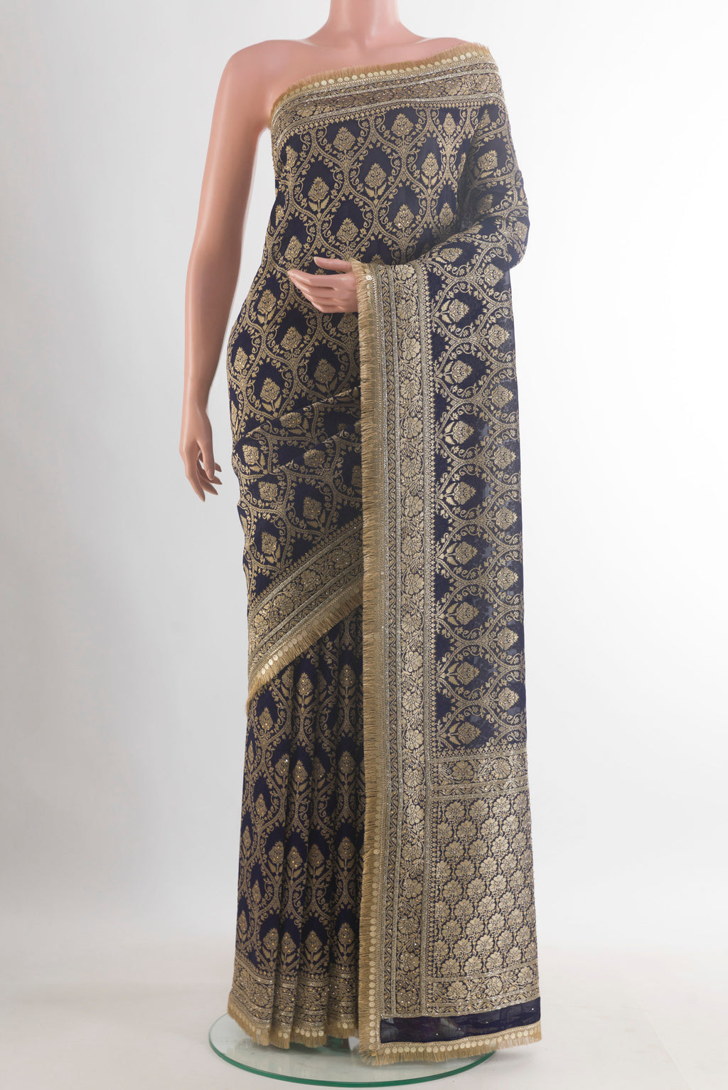 Navy Blue Blended Banarasi Georgette Saree with Zari Brocade on the body and Zari Border.  displayed on a mannequin