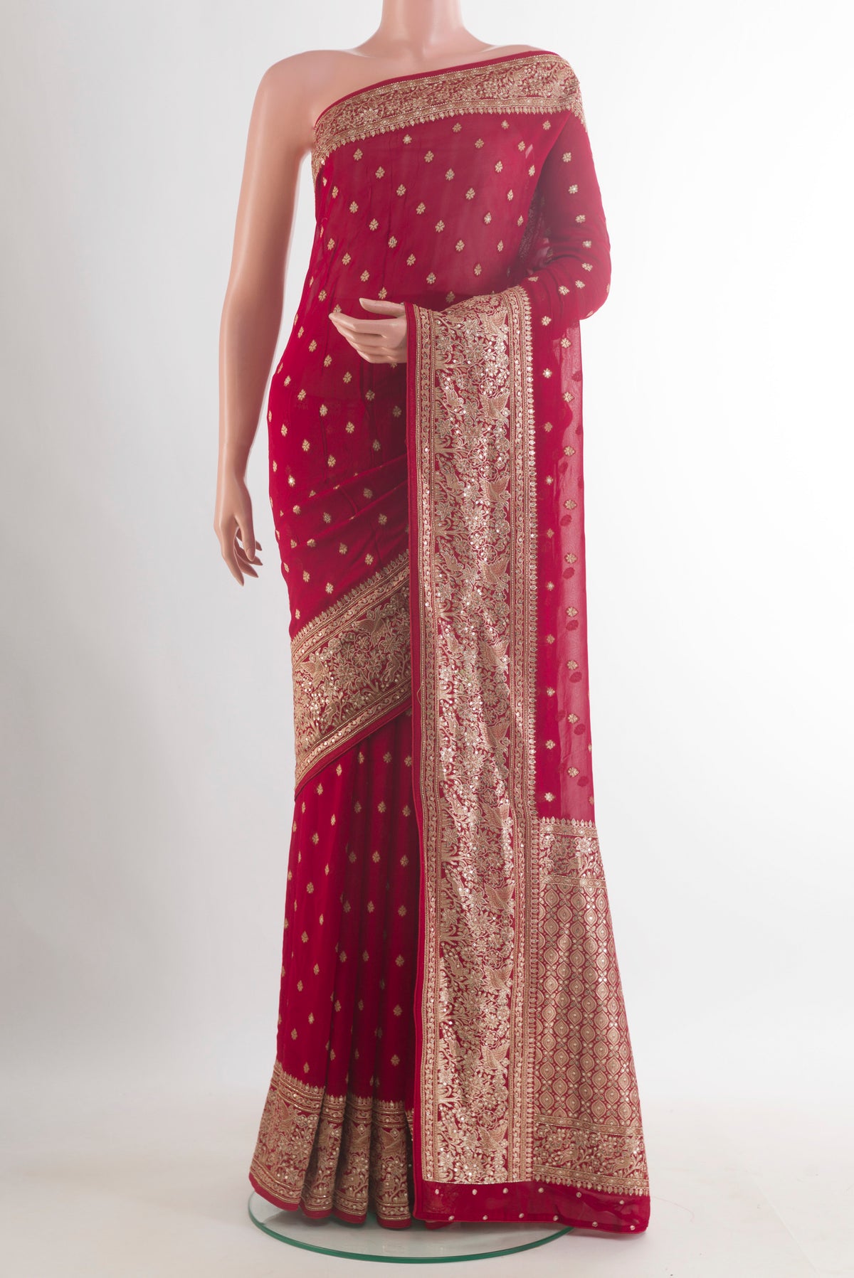 Red Blended Banarasi Georgette Saree with Zari Butta on the body and Zari Border.  displayed on a mannequin