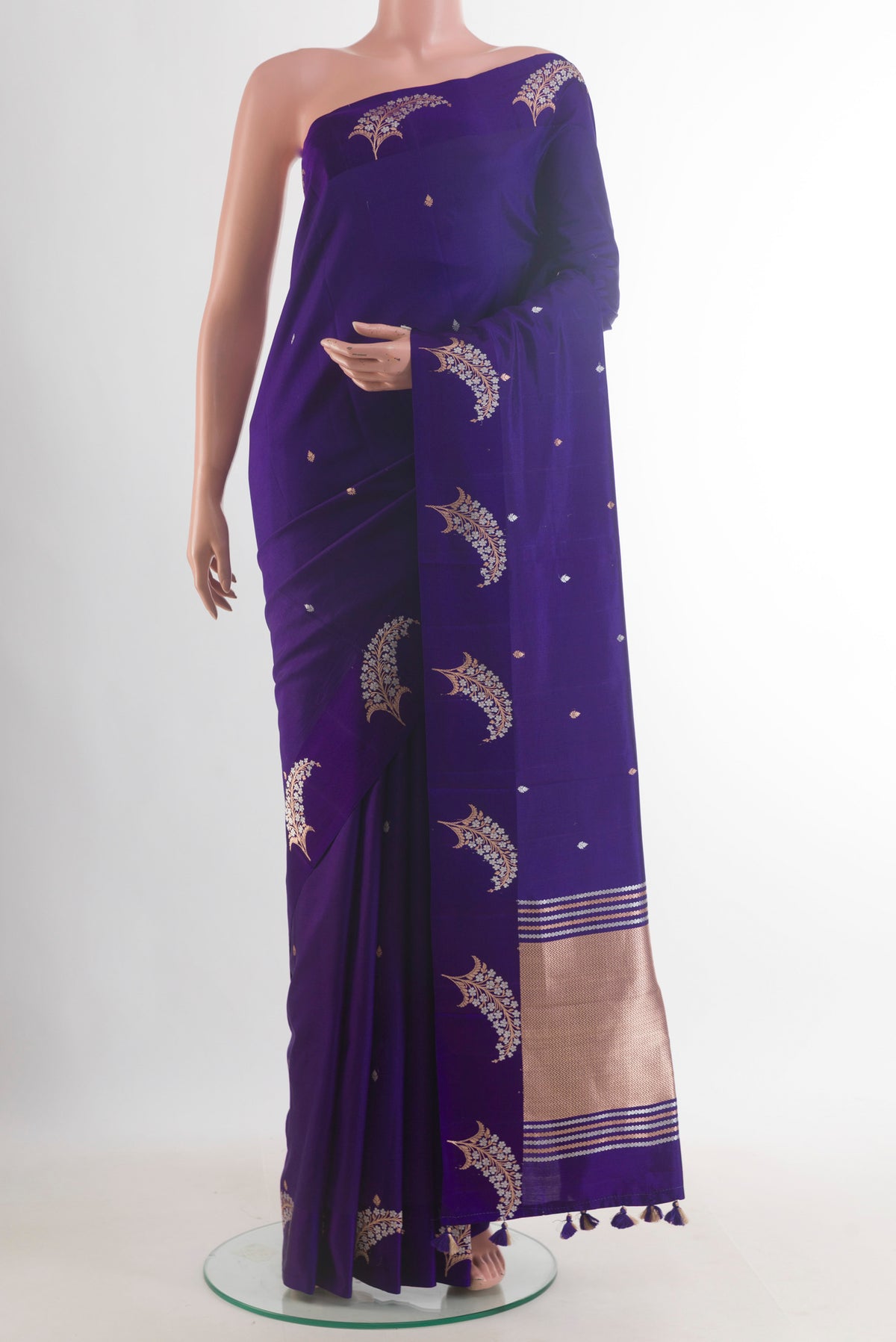 Pure Silk Navy Blue Banarasi Katan Saree with Zari Butta on the body and Zari Border.  displayed on a mannequin