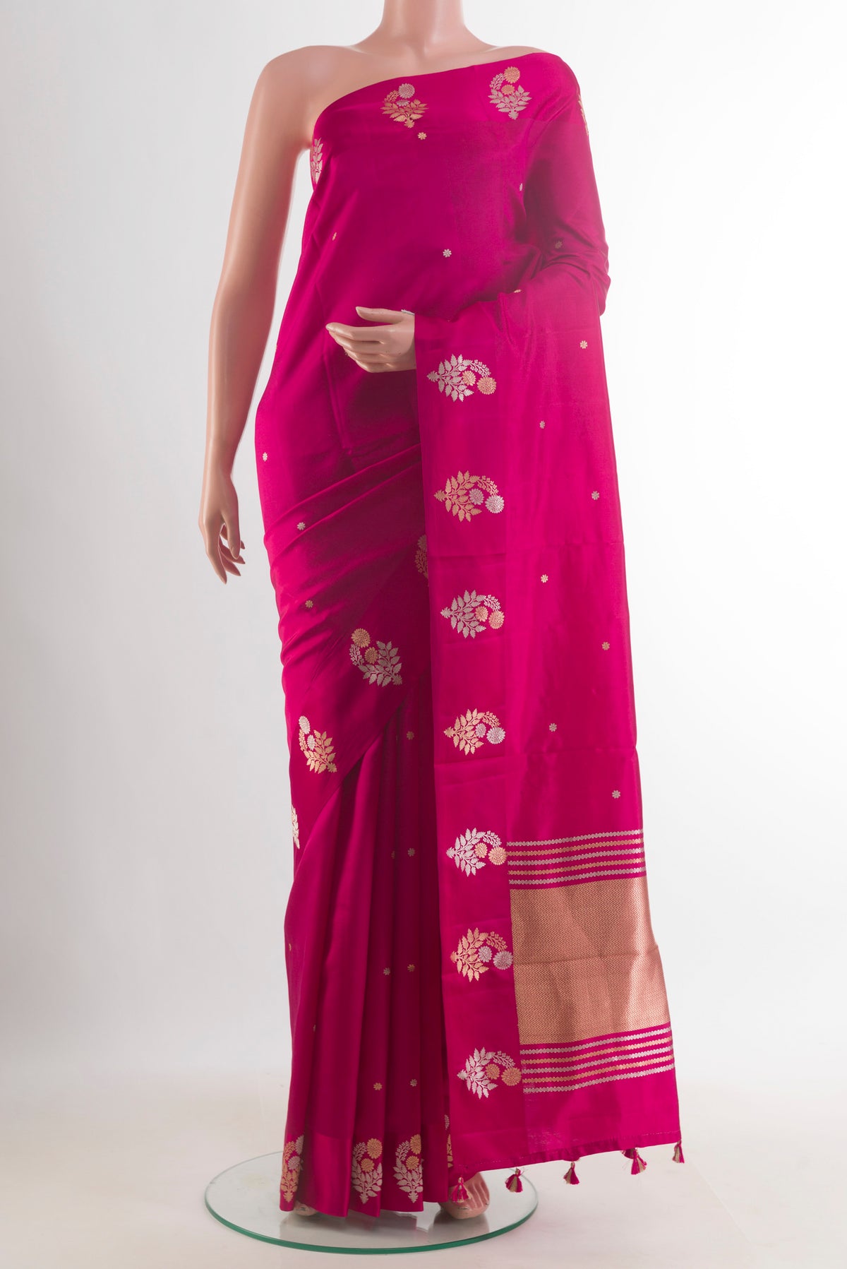 Pure Silk Pink Banarasi Katan Saree with Zari Butta on the body and Zari Border.  displayed on a mannequin