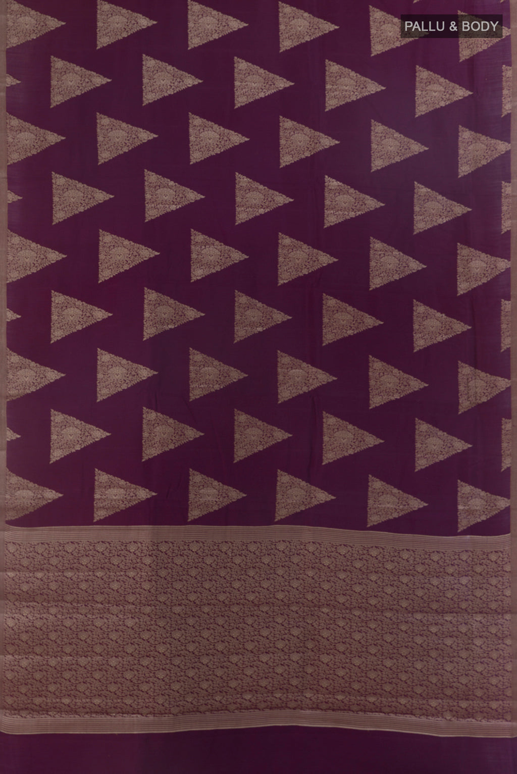 Flat view of Purple Tussar Saree with Zari Butta on the body and Zari Border. 