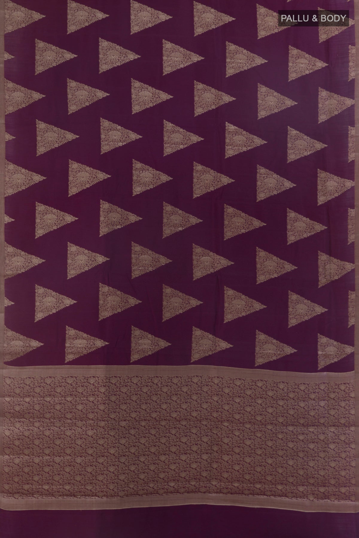 Flat view of Purple Tussar Saree with Zari Butta on the body and Zari Border. 