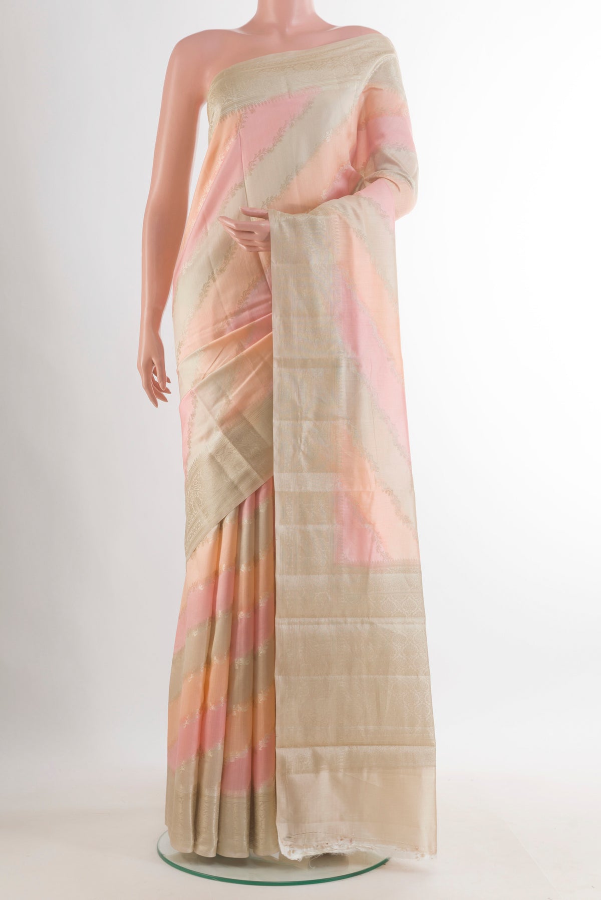 Multi Color Tussar Saree with Zari Brocade on the body and Zari Border.  displayed on a mannequin