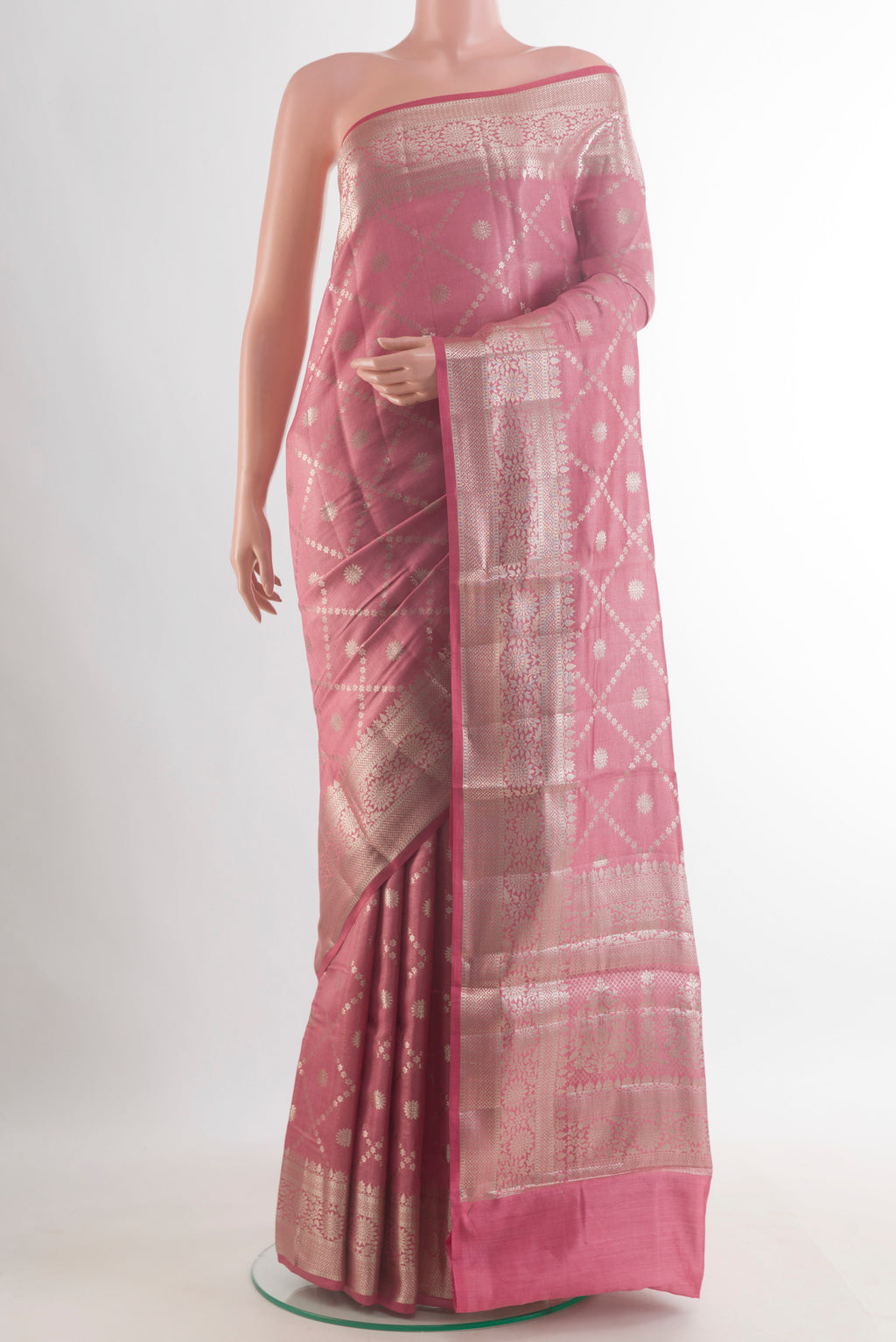 Pink Tussar Saree with Zari Brocade on the body and Zari Border.  displayed on a mannequin