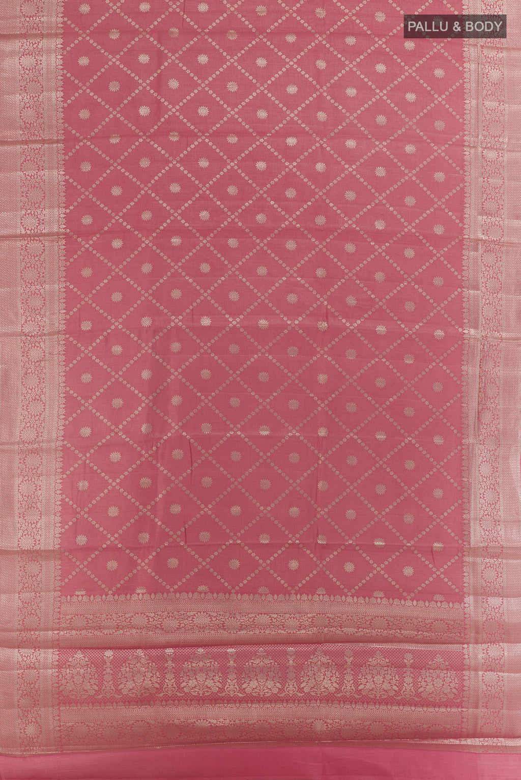 Flat view of Pink Tussar Saree with Zari Brocade on the body and Zari Border. 