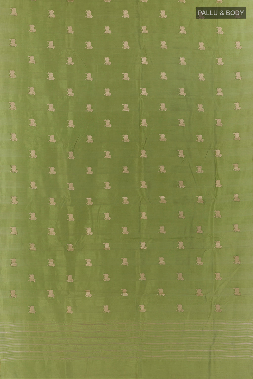 Flat view of Green Tussar Saree with Zari Butta on the body and Without Border. 