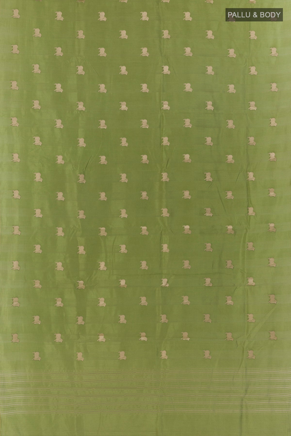Flat view of Green Tussar Saree with Zari Butta on the body and Without Border. 