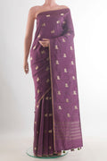 Purple Tussar Saree with Zari Butta on the body and Without Border.  displayed on a mannequin