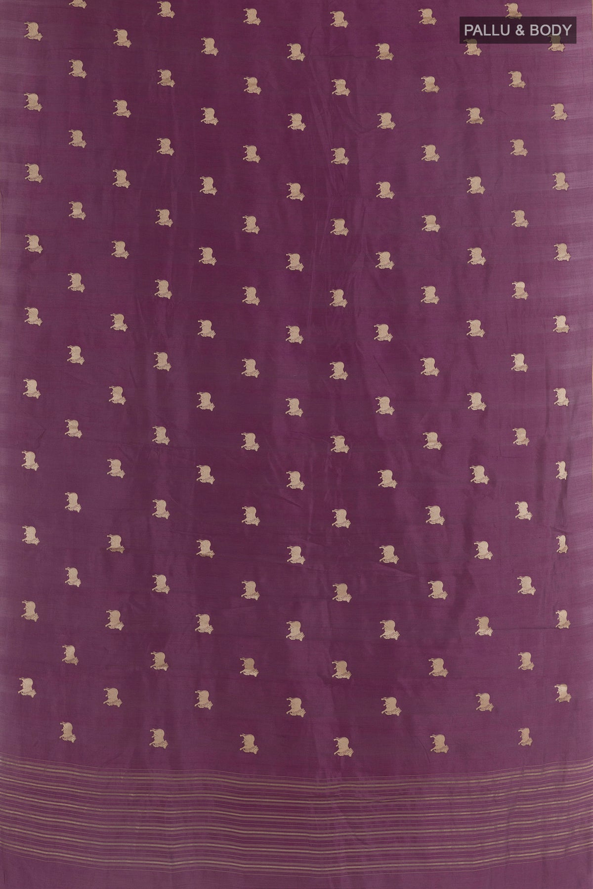 Flat view of Purple Tussar Saree with Zari Butta on the body and Without Border. 