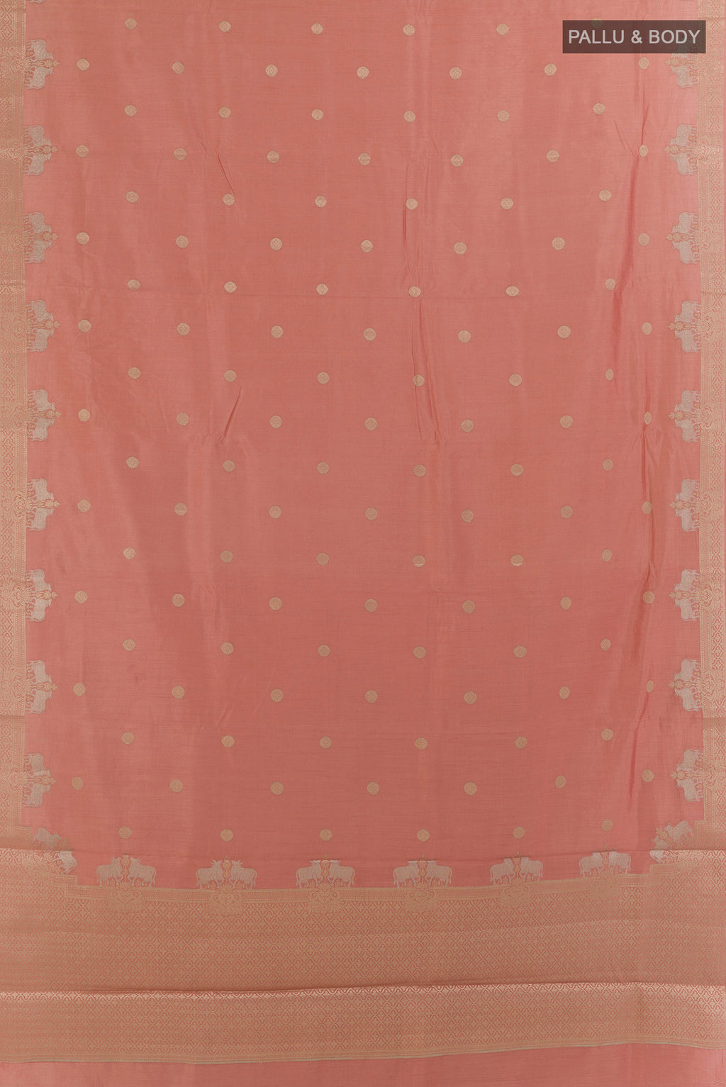 Flat view of Peach Tussar Saree with Zari Butta on the body and Zari Border. 