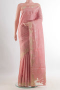 Peach Tussar Saree with Embroidered on the body and Embroidered Border.  displayed on a mannequin