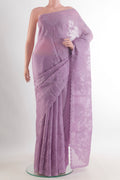 Lavender Organza Saree with Embroidered on the body and Embroidered Border.  displayed on a mannequin