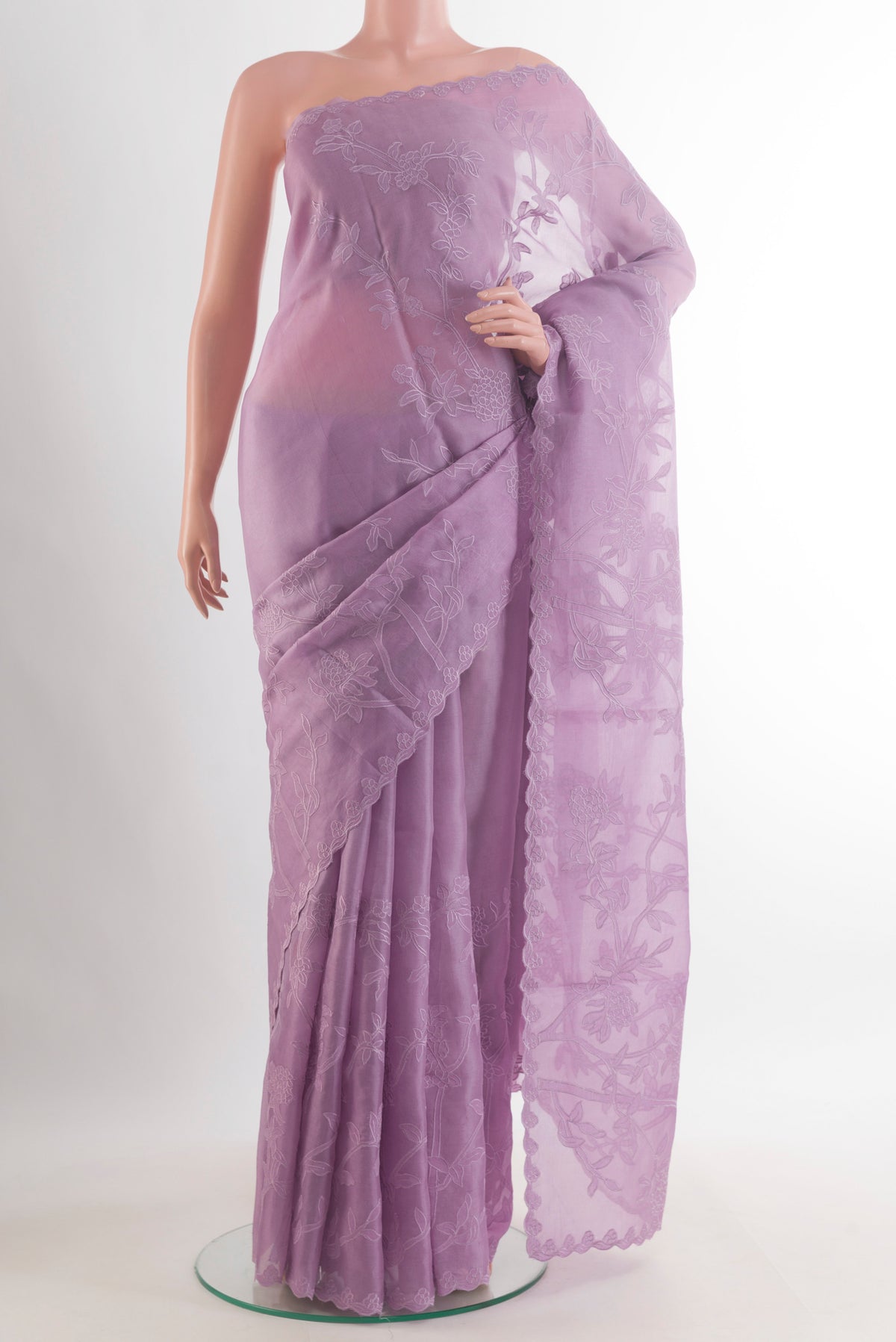 Lavender Organza Saree with Embroidered on the body and Embroidered Border.  displayed on a mannequin