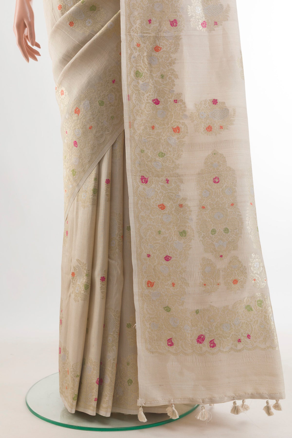 Pleats and pallu of Off White Banarasi Tussar Saree with Zari Butta on the body and Zari Border. 
