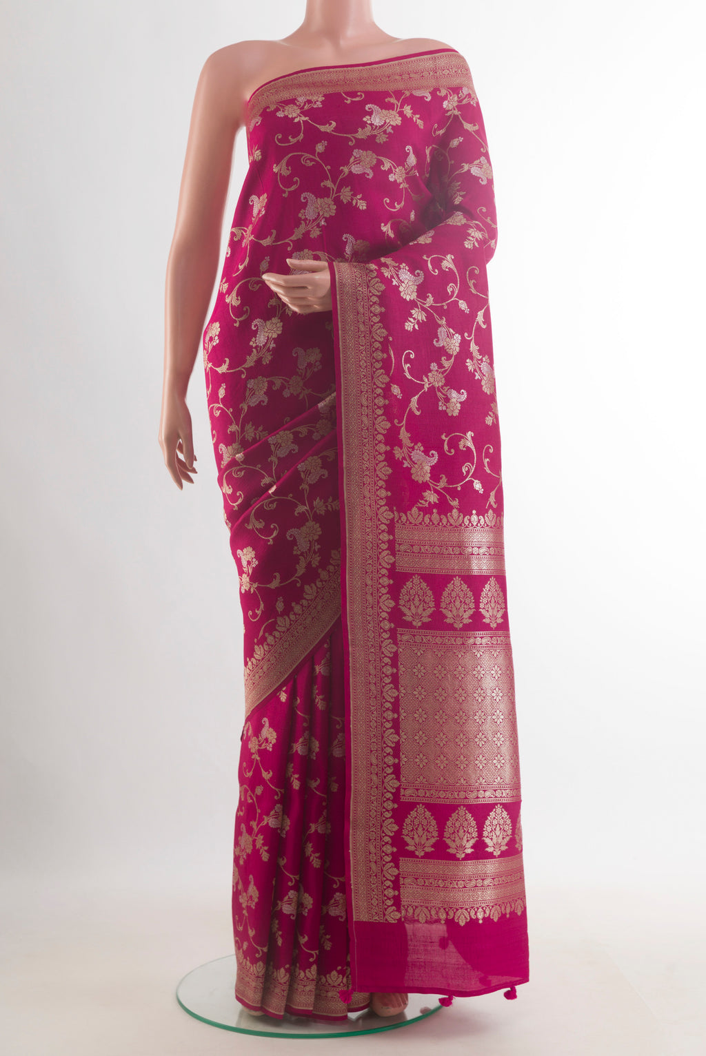 Dark Pink Banarasi Tussar Saree with Zari Brocade on the body and Zari Border.  displayed on a mannequin