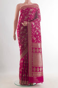 Dark Pink Banarasi Tussar Saree with Zari Brocade on the body and Zari Border.  displayed on a mannequin