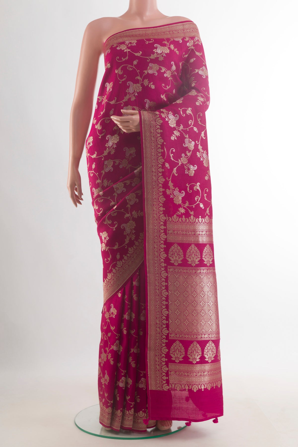 Dark Pink Banarasi Tussar Saree with Zari Brocade on the body and Zari Border.  displayed on a mannequin