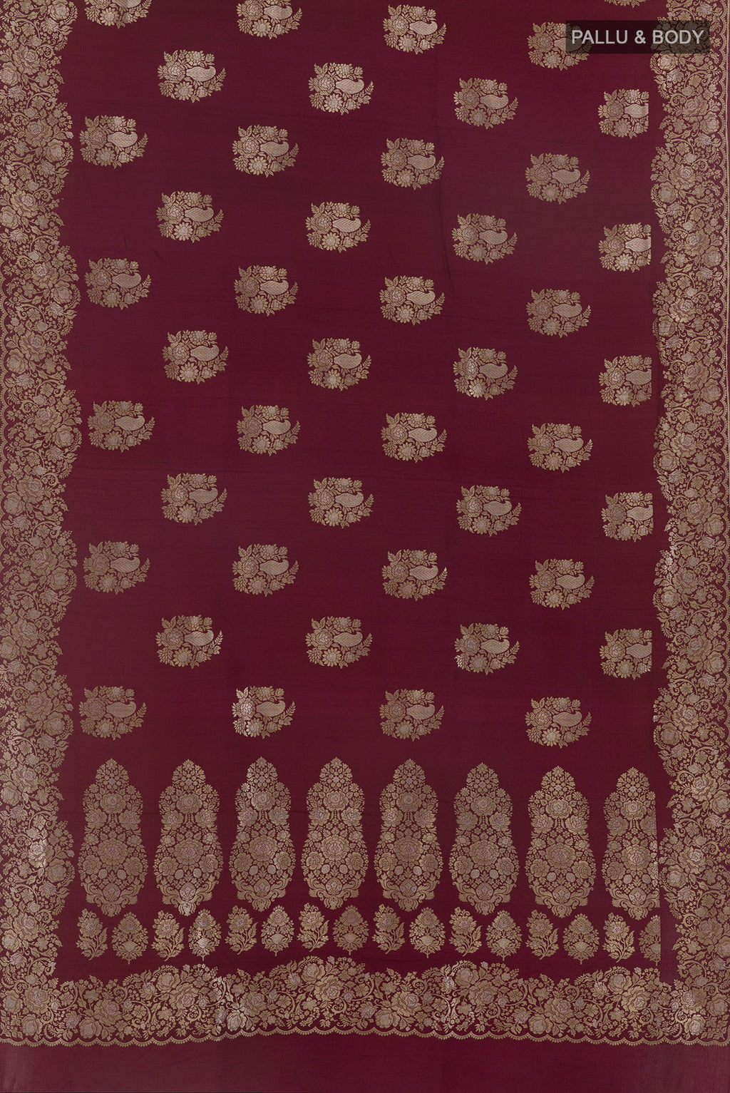 Flat view of Maroon Banarasi Tussar Saree with Zari Butta on the body and Zari Border. 