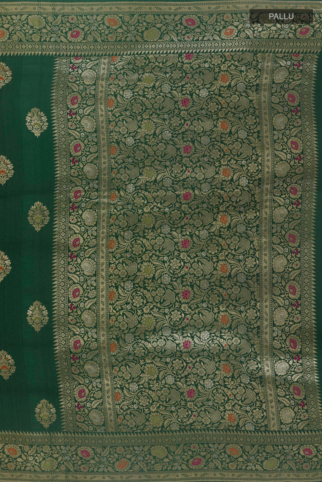 Close up image of the pallu of Green Banarasi Tussar Saree with Zari Butta on the body and Zari Border. 