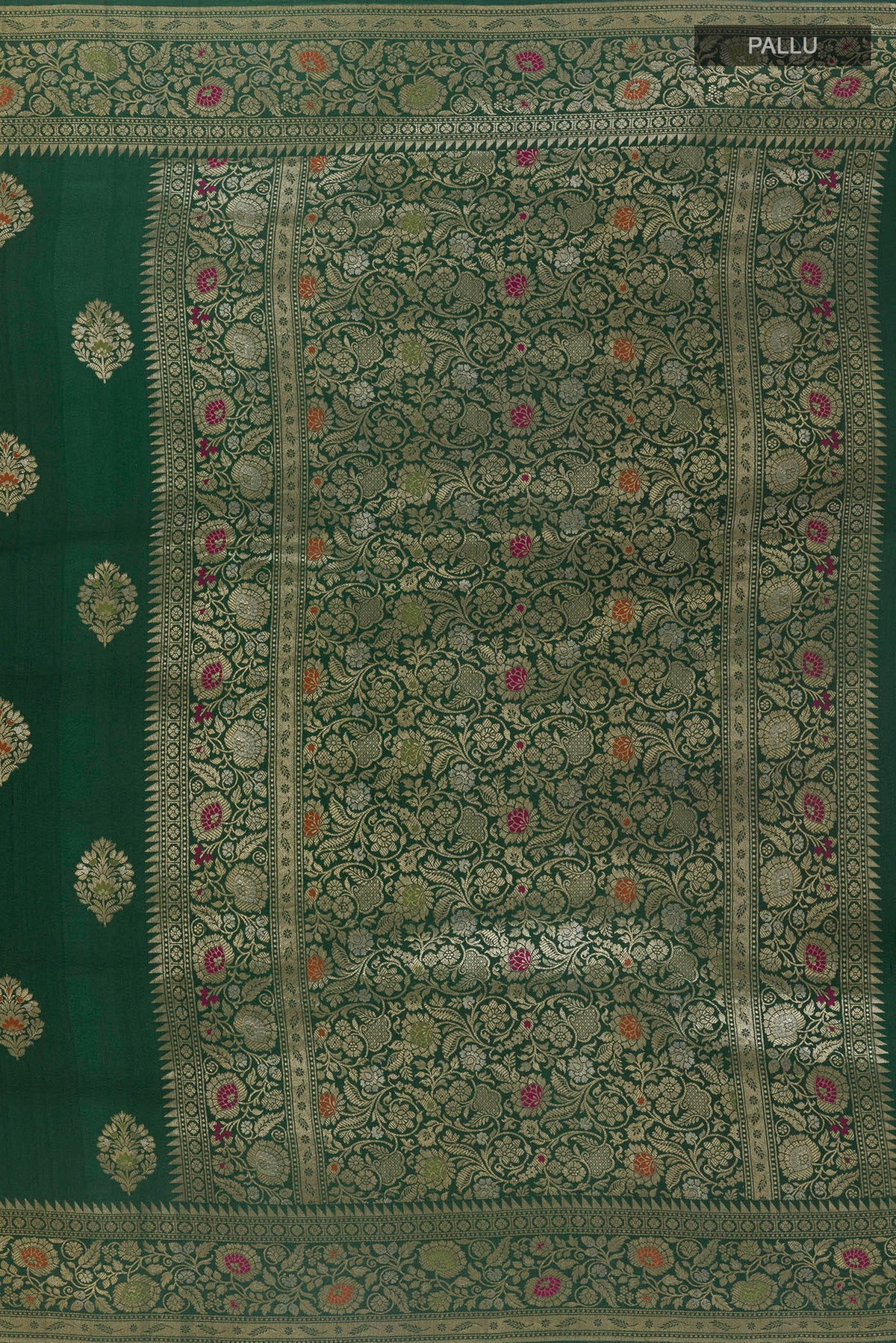 Close up image of the pallu of Green Banarasi Tussar Saree with Zari Butta on the body and Zari Border. 