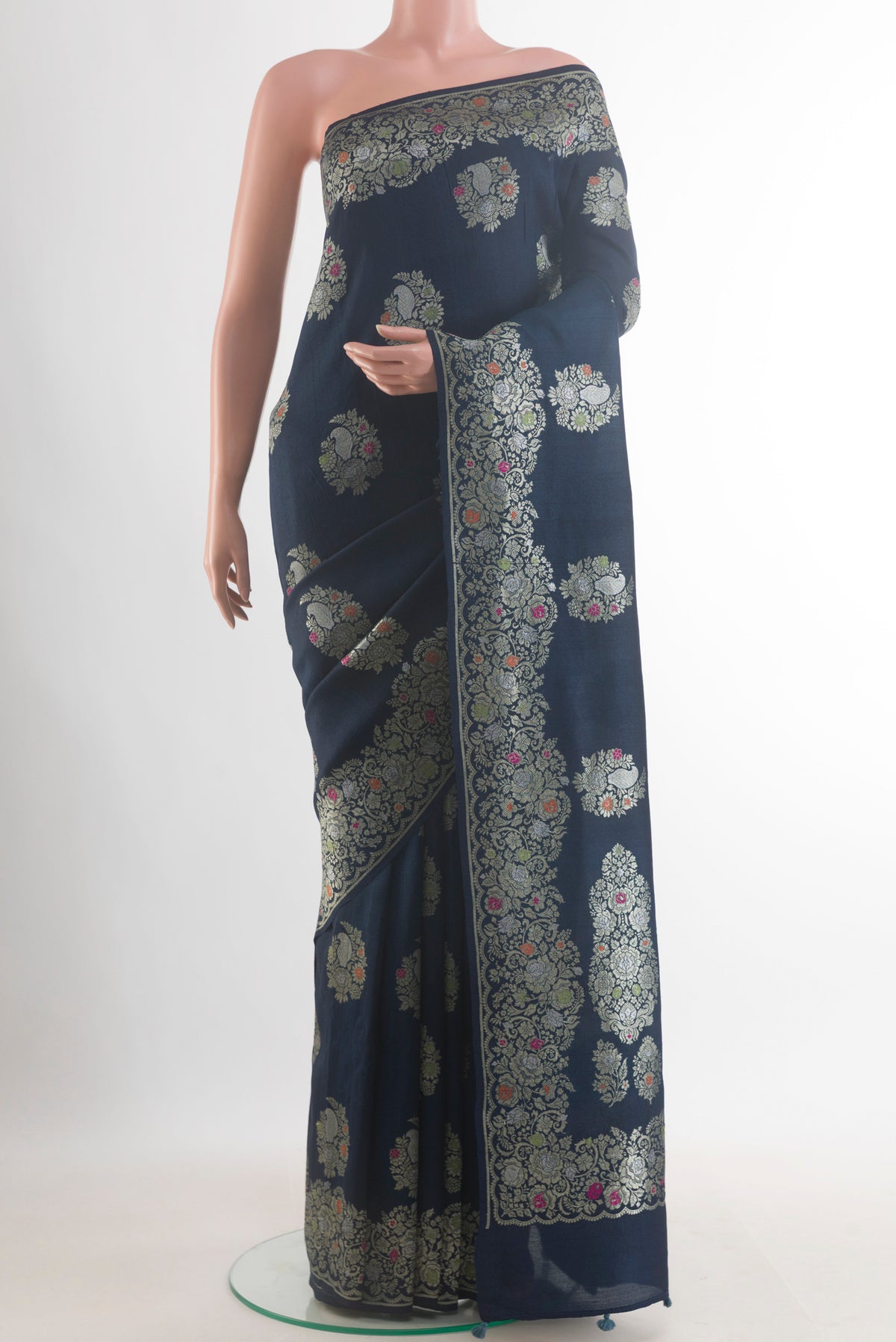 Navy Blue Banarasi Tussar Saree with Zari Butta on the body and Zari Border.  displayed on a mannequin