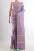 Lavender Tussar Saree with Zari Brocade on the body and Zari Border.  displayed on a mannequin