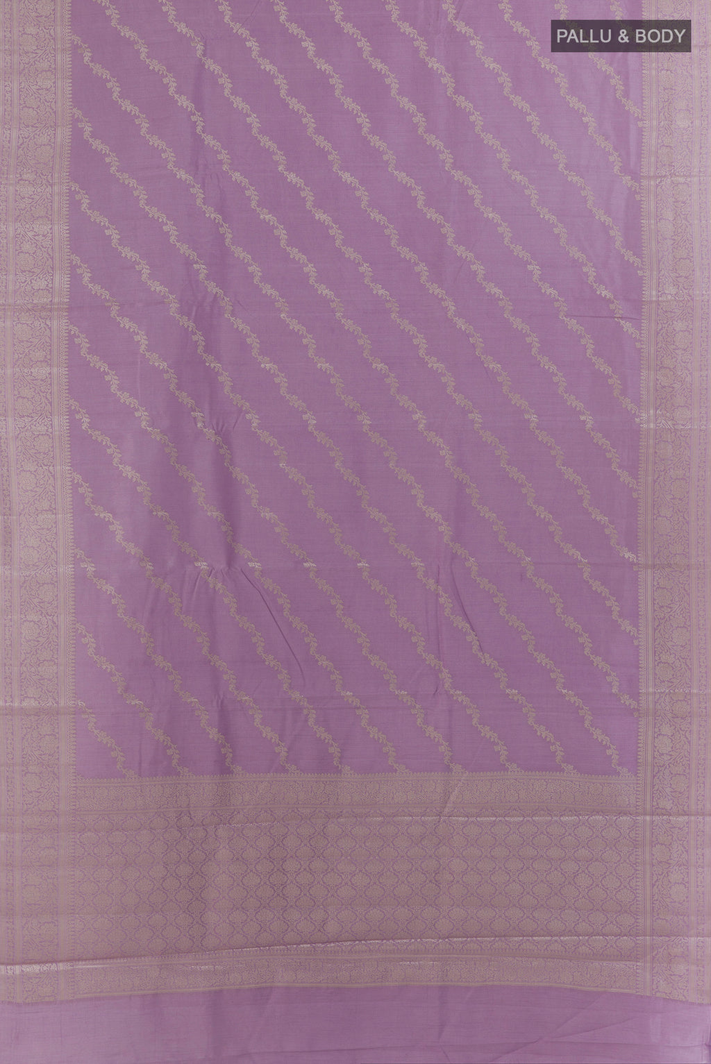 Flat view of Lavender Tussar Saree with Zari Brocade on the body and Zari Border. 