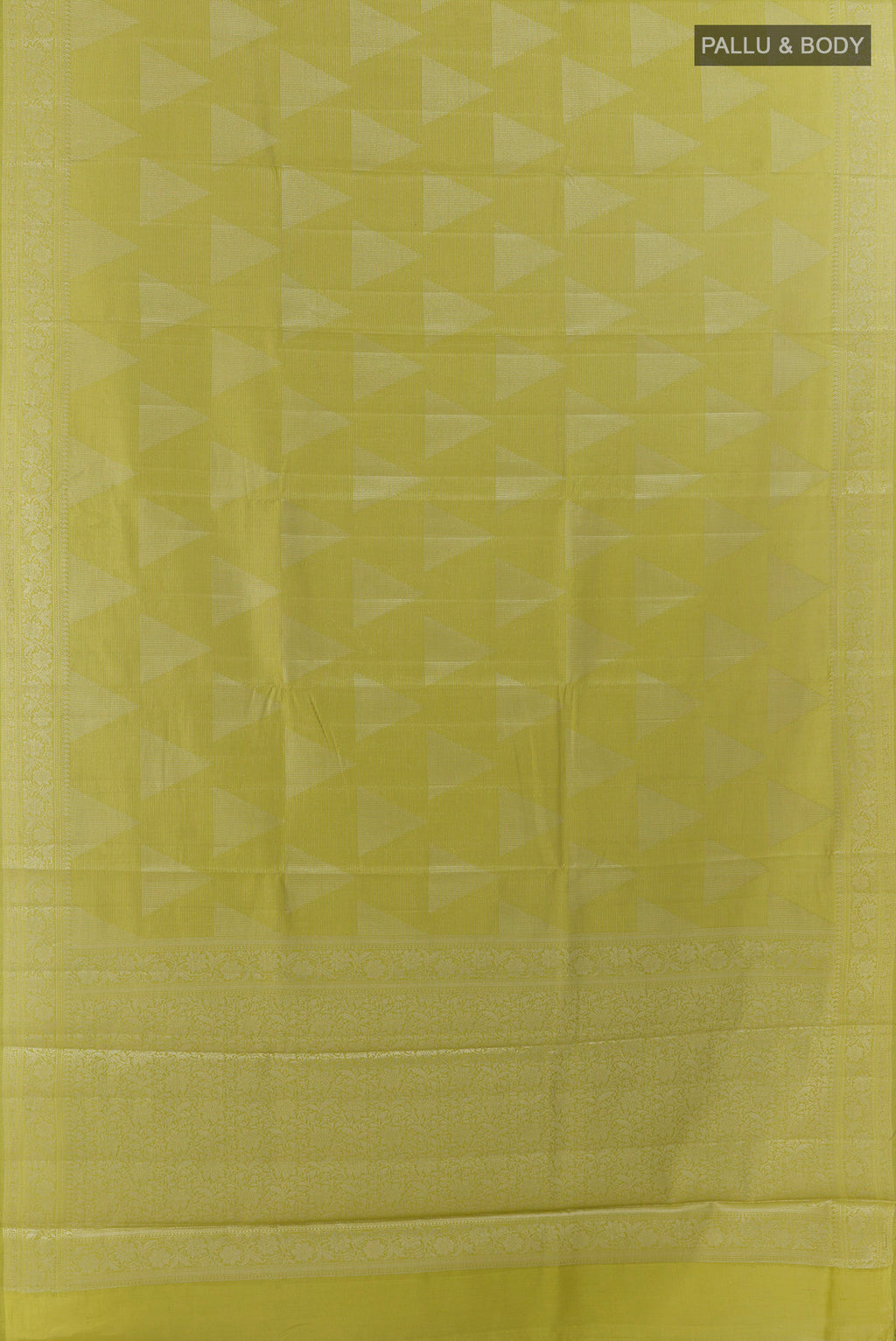 Flat view of Green Tussar Saree with Zari Butta on the body and Zari Border. 