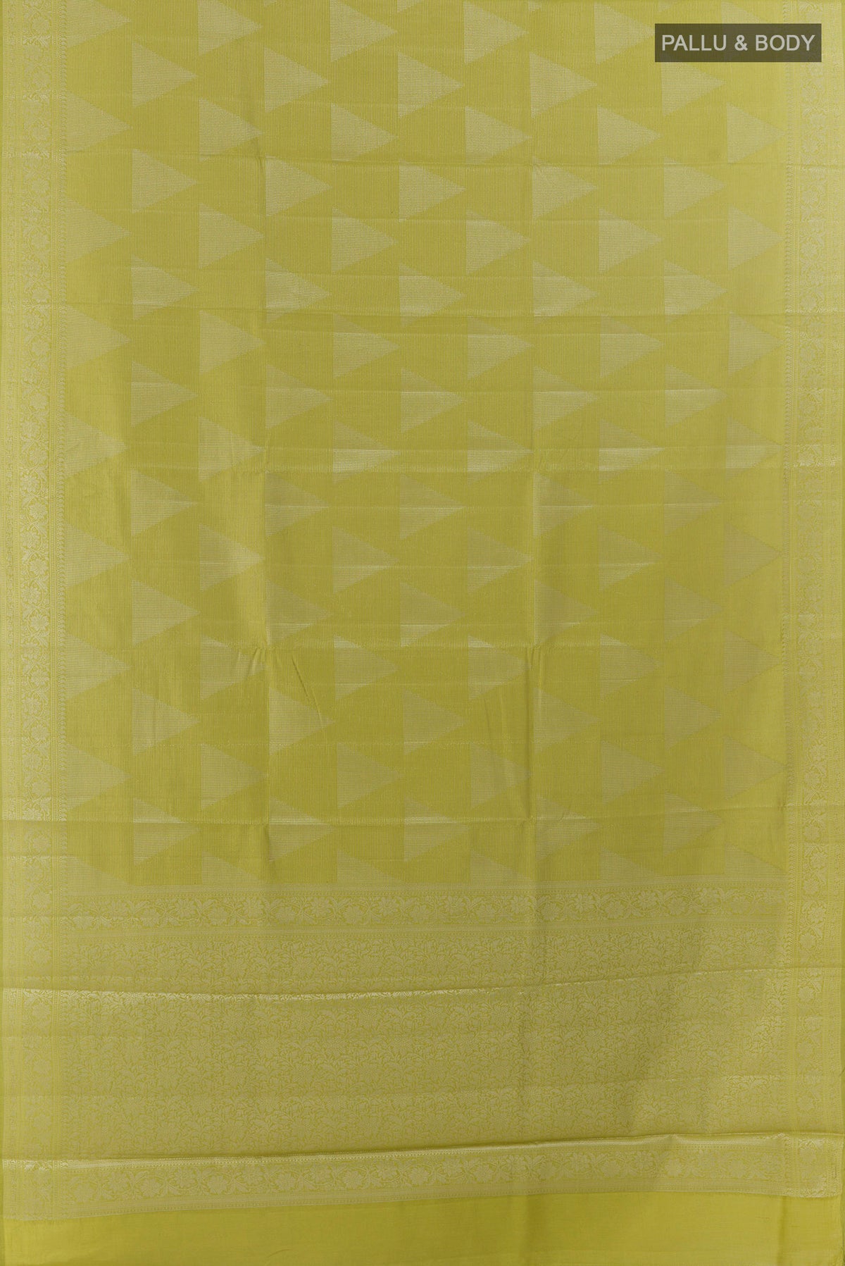 Flat view of Green Tussar Saree with Zari Butta on the body and Zari Border. 