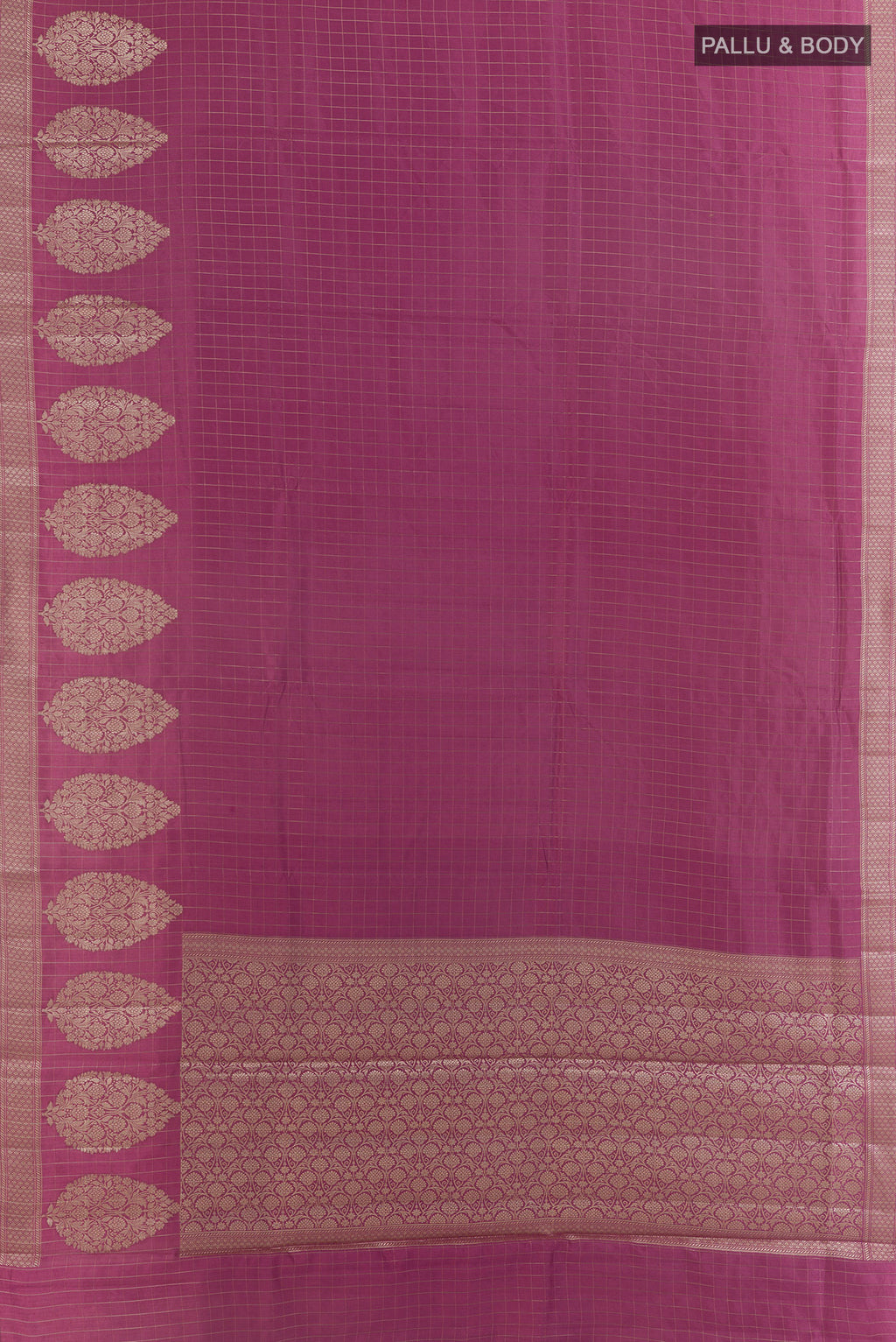 Flat view of Mauve Tussar Saree with Checked design on the body and Zari Border. 