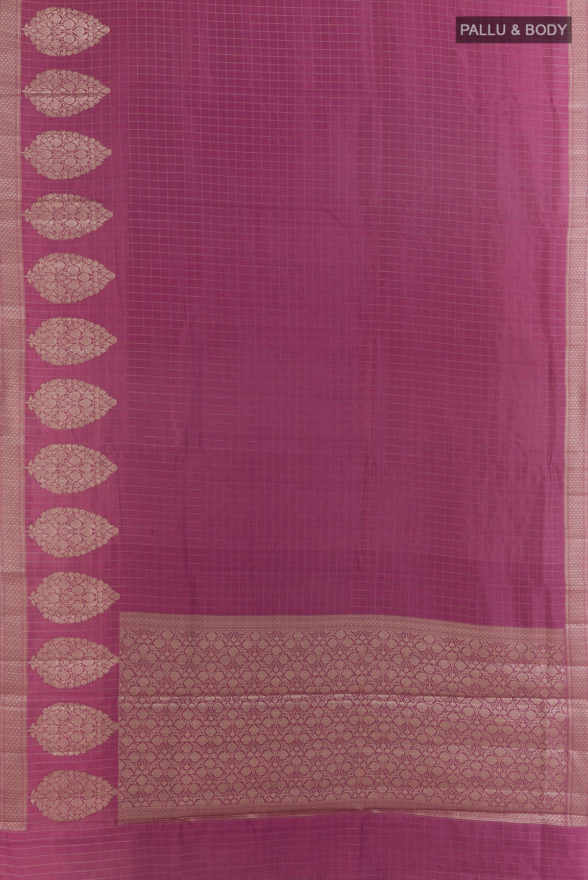 Flat view of Mauve Tussar Saree with Checked design on the body and Zari Border. 