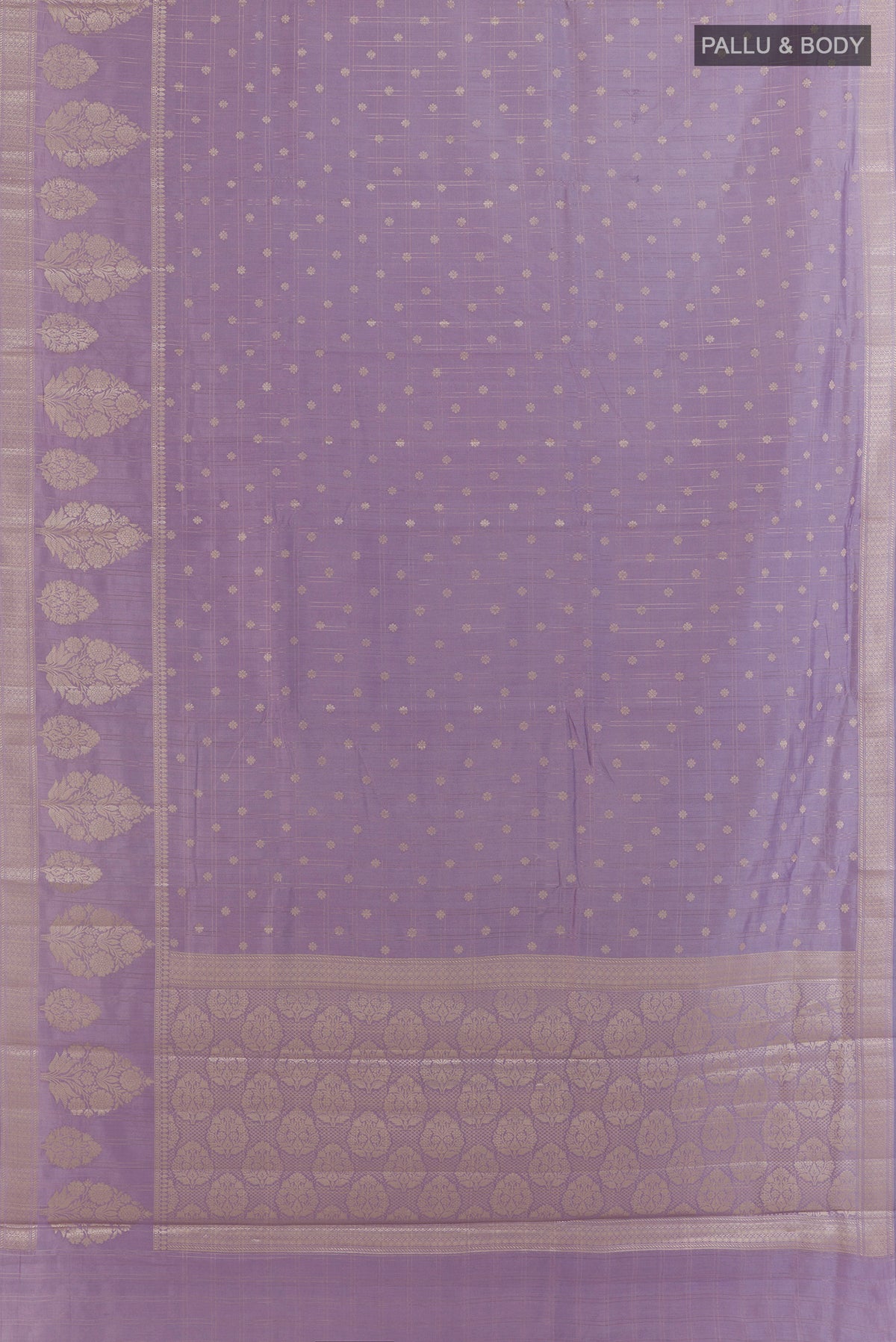 Flat view of Lavender Tussar Saree with Checked design on the body and Zari Border. 