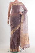 Davys Grey Organza Saree with Zari Butta on the body and Zari Border.  displayed on a mannequin