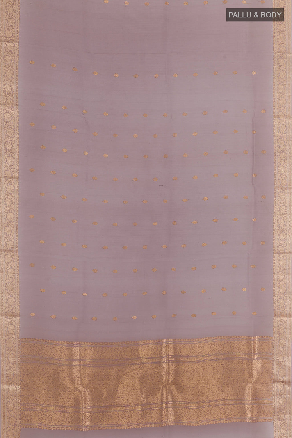 Flat view of Davys Grey Organza Saree with Zari Butta on the body and Zari Border. 