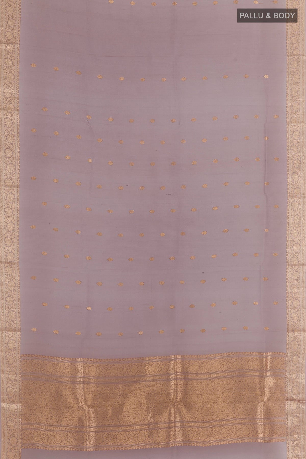 Flat view of Davys Grey Organza Saree with Zari Butta on the body and Zari Border. 