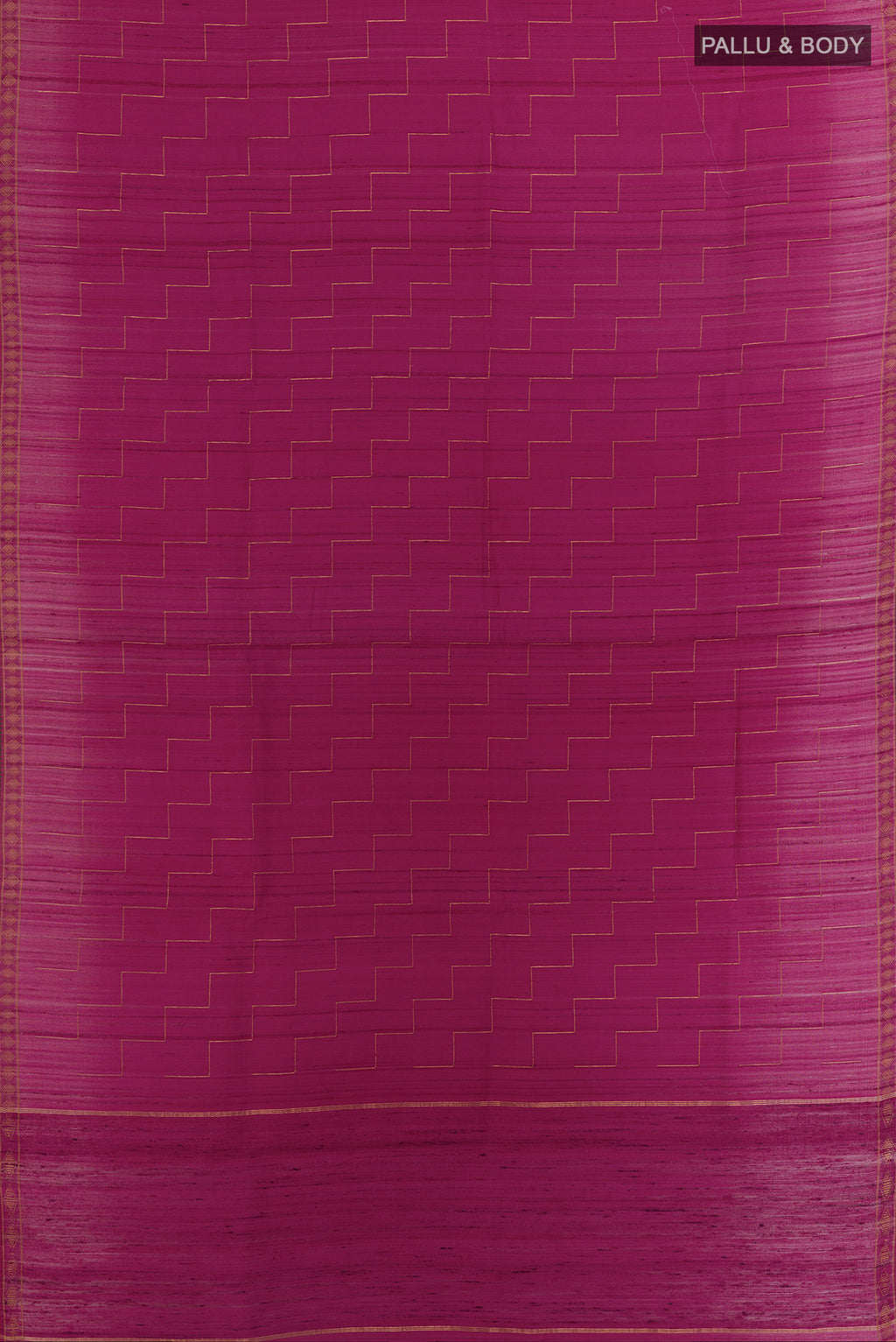 Flat view of Magenta Tussar Saree with Zig Zag design on the body and Zari Border. 