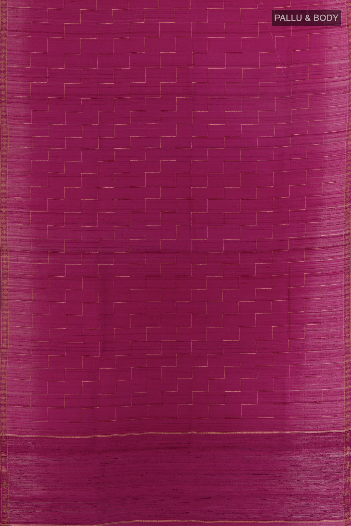 Flat view of Magenta Tussar Saree with Zig Zag design on the body and Zari Border. 