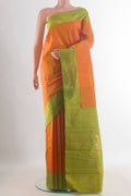 Pure Silk Orange Kanchipuram Saree with Zari Butta on the body and Zari Border.  displayed on a mannequin