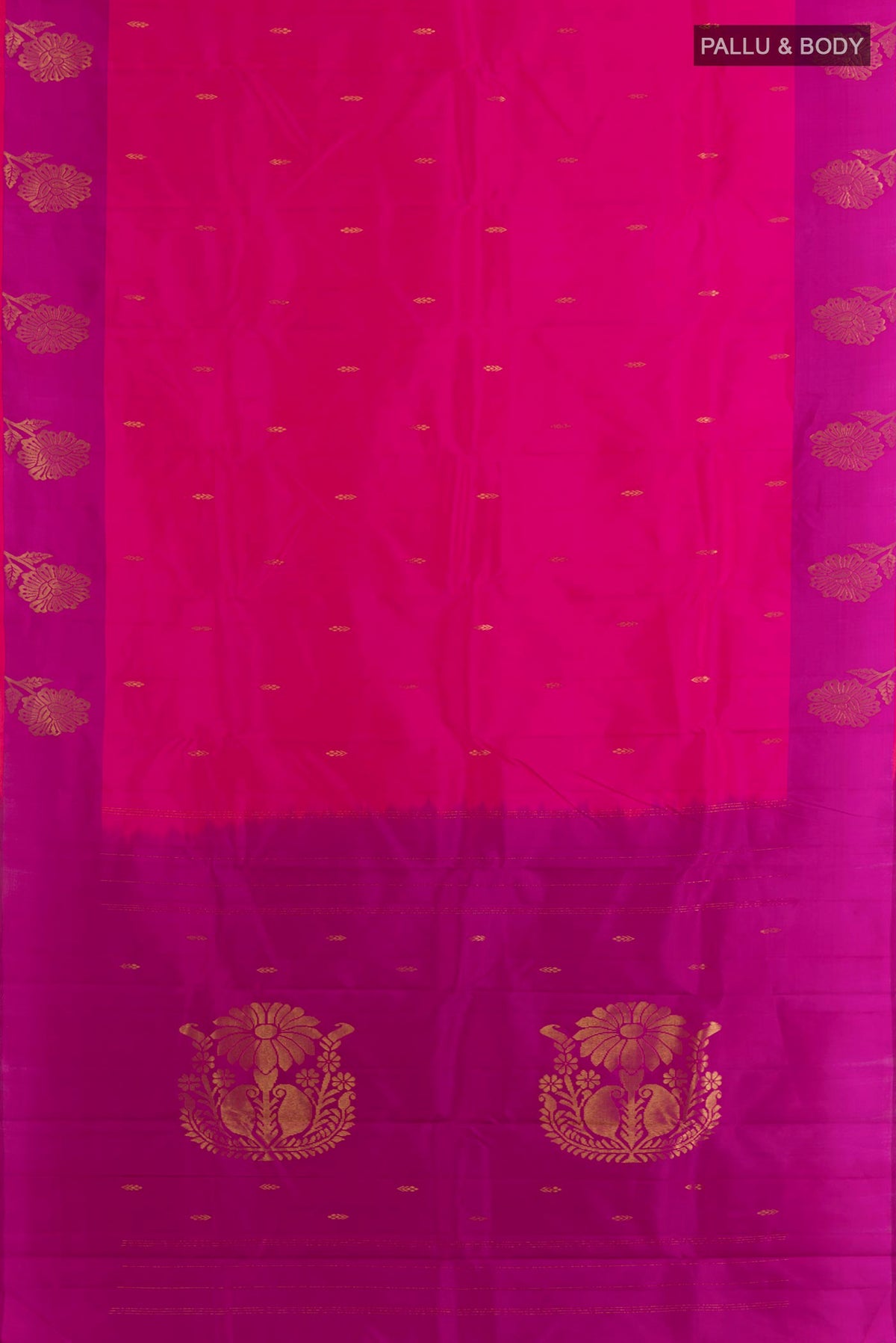 Flat view of Pure Silk Pink Kanchipuram Saree with Zari Butta on the body and Zari Border. 