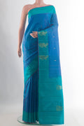 Pure Silk Blue Kanchipuram Saree with Zari Butta on the body and Zari Border.  displayed on a mannequin