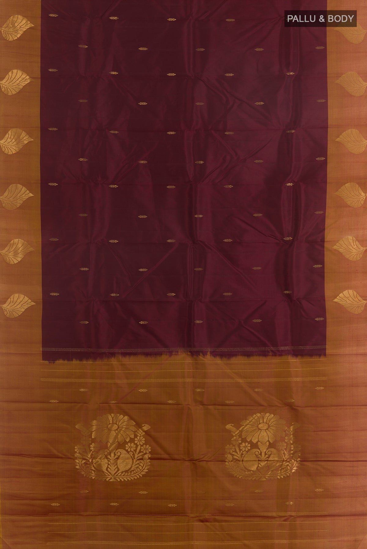 Flat view of Pure Silk Brown Kanchipuram Saree with Zari Butta on the body and Zari Border. 