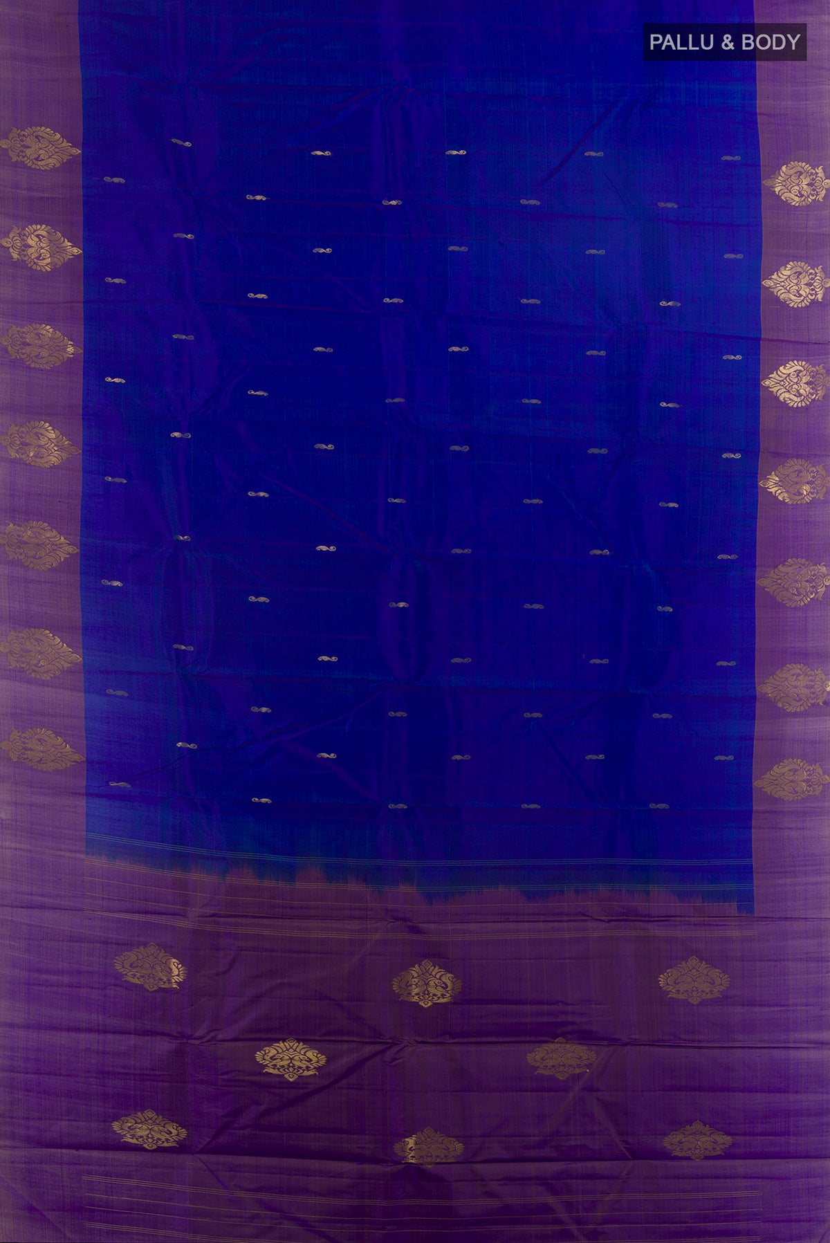Flat view of Pure Silk Royal Blue Kanchipuram Saree with Zari Butta on the body and Zari Border. 