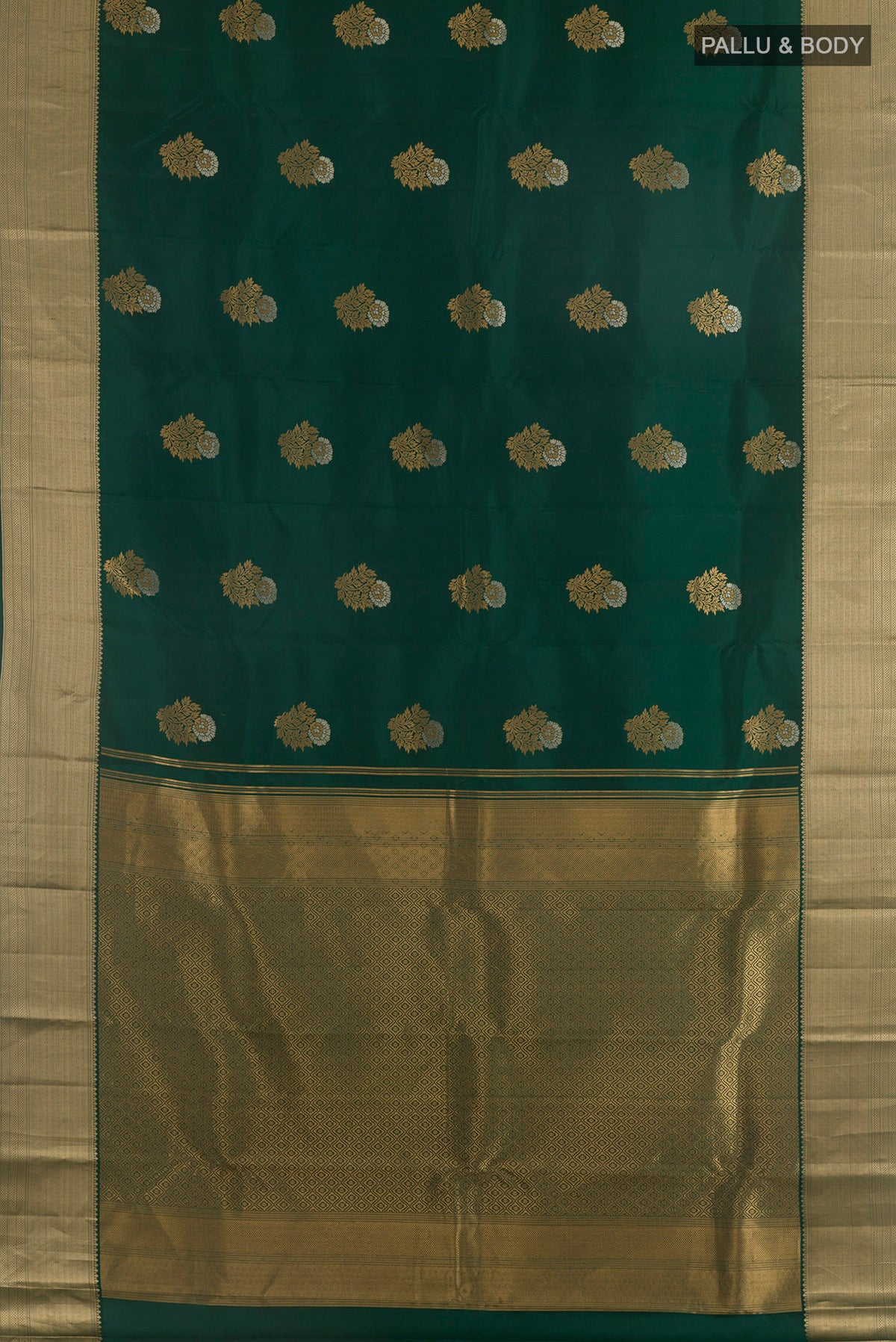 Flat view of Pure Silk Bottle Green Kanchipuram Saree with Zari Butta on the body and Zari Border. 