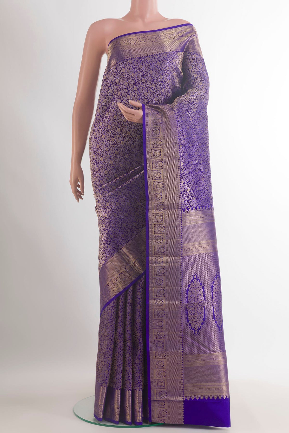 Pure Silk Royal Blue Kanchipuram Saree with Zari Brocade on the body and Zari Border.  displayed on a mannequin