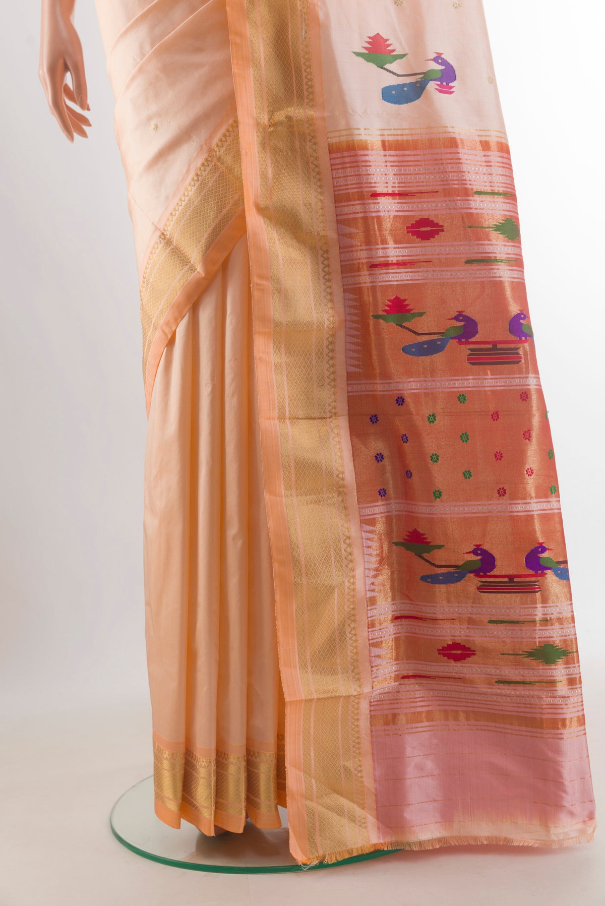 Pleats and pallu of Pure Silk Rose pink Paithani Saree with Zari Butta on the body and Zari Border. 