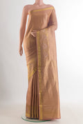 Pure Silk Golden Kanchipuram Saree with Stripes on the body and Zari Border.  displayed on a mannequin