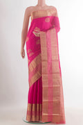Pure Silk Pink Kanjivaram Saree with Zari Butta on the body and Zari Border.  displayed on a mannequin
